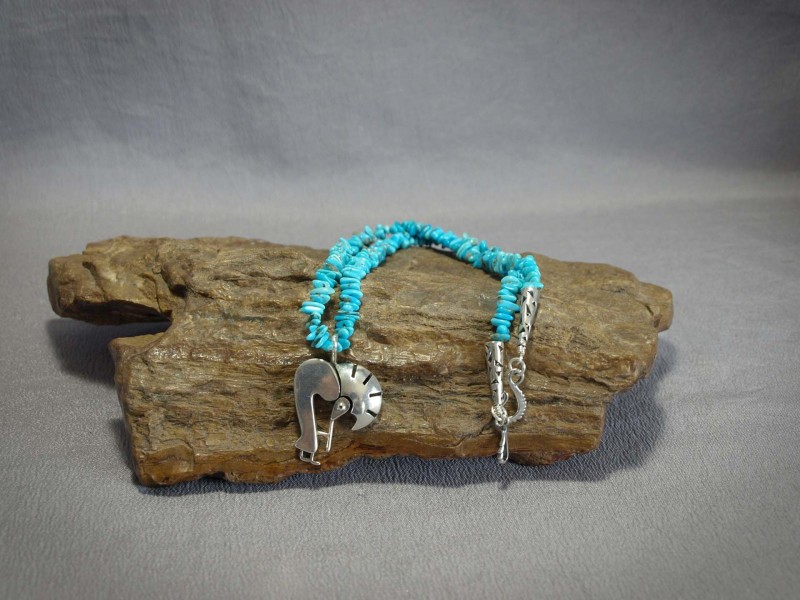 Single strand Castle Dome Turquoise, Sterling Silver Kokopelli, cones and clasp - 18 in