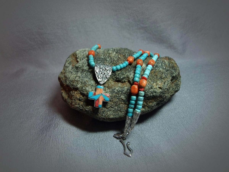Single Strand Necklace Sleeping Beauty Turquoise, Coral, Orange Sponge Coral, Cross Inlay pendent (Turquoise, Coral, Orange Sponge Coral), Sterling silver cones and clasp - 27 in & Pendent is1.5 in Necklace is $250.00