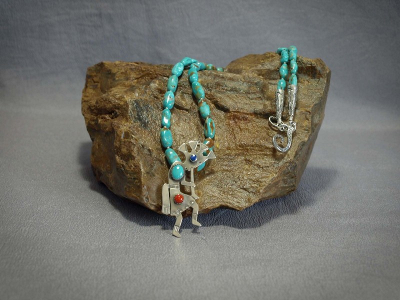 Single strand Turquoise, silver seed beads, Sterling silver Kokopelli with Lapis, Turquoise and Apple Coral, Sterling silver cones and clasp - 19 in