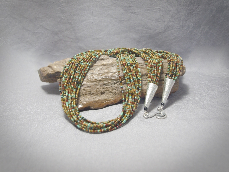 NC1119 - 15 strand Necklace Seed Bead Travertine Parquet, Sterling silver cones & clasp 25 in - $140.00