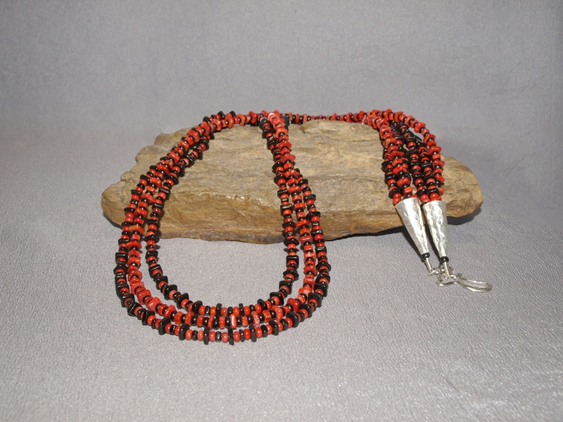 3 strand necklace 6mm Jet & Apple Coral Chicklets, 4mm Jet & Apple Coral Chicklets, 4mm Jet & Apple Coral Rondell's, sterling silver cones and clasp - 36 in Necklace is $275.00